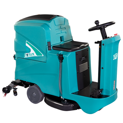 Ride-on floor cleaning machine